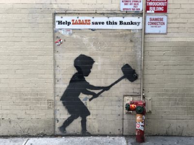 Banksy “Hammer Boy” Mural